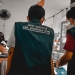 Petugas dari Dinas Kesehatan Kabupaten Gorontalo Utara saat memonitoring penjualan obat sirup di salah satu apotek di wilayah Kecamatan Kwandang, Kabupaten Gorontalo Utara. (Foto.isno/gopos)