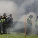 Aparat keamanan menembakkan gas air mata untuk menghalau suporter yang masuk lapangan usai pertandingan sepak bola BRI Liga 1 antara Arema melawan Persebaya di Stadion Kanjuruhan, Malang, Sabtu (1/10/2022). ANTARA/Suara.com
