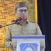 Penjabat Gubernur (Penjagub) Gorontalo, Hamka Hendra Noer saat memberikan sambutan di Kegiatan Dialog Bersama Camat, Lurah Dan Kepala Desa Se–Provinsi Gorontalo di Gedung El Hajj Convention, Selasa (27/12/2022). (Foto: Putra/Gopos)