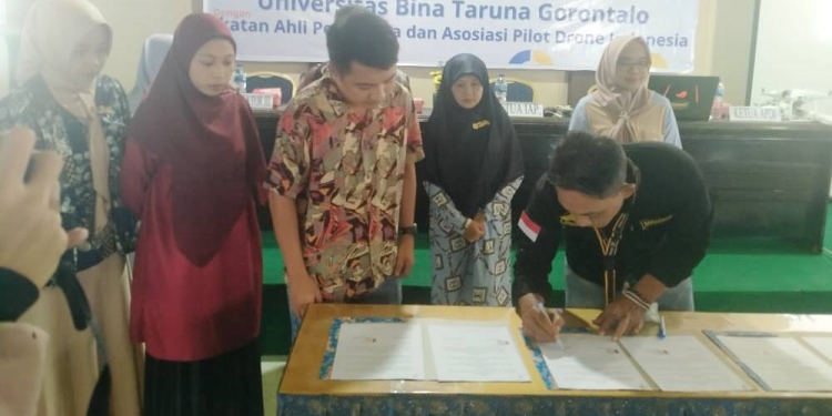 Penandatanganan kerja sama antara UNBITA Gorontalo bersama ABDI Sulawesi Utara, Jumat (16/12/2022) (muhajir/gopos)