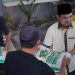 Wakil Wali Kota Gorontalo, Ryan Kono ikut mendistribusikan Infaq Beras melalui Distributsi Gerakan Infaq Beras (GIB), Sabtu (14/1/2023). (Foto: Humas)