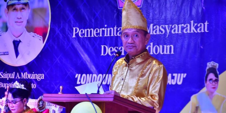 Bupati Pohuwato, Saipul Mbuinga, Memberikan Sambutan Upacara Perayaan Adat Tulude, di Desa Londoun, Kecamatan Popayato Timur, Pohuwato, Selasa 31/01/2023 (Istimewa)