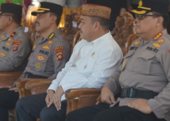 Ketua Dewan Perwakilan Rakyat Daerah (DPRD) Kabupaten Bone Bolango, Halid Tangahu saat menghadiri  kegiatan pelantikan Kapolres Bone Bolango, AKBP Muhammad Ali di Polres Bone Bolango, Rabu (4/1/2023). (Foto: Putra/Gopos)
