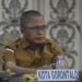 Sekertaris Daerah Kota Gorontalo, Ismail Madjid memaparkan hasil evaluasi Anggaran Pendapatan Belanja Daerah (APBD) dan Anggaran Pendapatan Belanja Nasional (APBN) Triwulan ke IV tahun 2022 Kota Gorontalo dalam Rakorev Penyerapan Anggaran APBD dan APBN Triwulan IV T.A 2022 Tingkat Prov Gorontalo di Aula Kantor Gubernur Gorontalo, Selasa (31/1/2023). (foto: Putra/Gopos)
