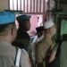 Personel Babinsa dan Polri melakukan identifikasi serta olah tempat kejadian perkara peristiwa gantung diri di Kelurahan Kayumerah, Kecamatan Limboto, Kabupaten Gorontalo