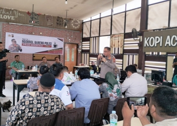 Kepolisian Daerah (Polda) Gorontalo melaksanakan Ngobrol Bareng Polisi (Ngopi) di Warkop Aceh, Kota Gorontalo, Jumat (6/1/2023). (Foto: Putra/Gopos)