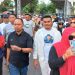 Ketua DPW Garpu Gorontalo, Sawaludin (jaket putih) bersama Sekda Kabupaten Gorontalo, Roni Sampir (kaos biru) mengikuti jalan sehat bersama DPW Garpu Provinsi Gorontalo memeringati Hari Patriotik 23 Januari 1942, Ahad (29/1/2023)