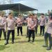 Capt Foto : Kapolres Bone Bolango, AKBP Muhammad Alli saat mendampingi Kapolda Gorontalo, Irjen Pol Helmy Santika dalam memantau jalannya Pilkades serentak, Senin (23/1/2023). (Foto Humas Polres Bone Bolango