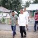 Ketua DPC Gerindra Pohuwato, Saipul Mbuinga, Didampingi Wakil Ketua DPC Gerindra Pohuwato, Abdul Rahman Murad (ARM), Saat Meresmikan Rumah Aspirasi,  di Desa Teratai, Kecamatan Marisa, Pohuwato, Jum'at 27/01/2023 (Istimewa)