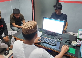 Tiga remaja yang diduga memerkosa seorang gadis saat malam pergantian tahun menjalani pemeriksaan di Polres Gorontalo Kota. (istimewa)