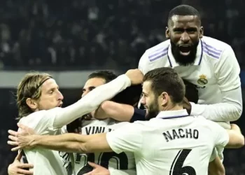 Para pemain Real Madrid merayakan gol kedua mereka yang dicetak oleh Vinicius Junior selama pertandingan tunda pekan ke-17 Liga Spanyol 2022-2023 antara Real Madrid vs Valencia di stadion Santiago Bernabeu di Madrid pada 2 Februari 2023. JAVIER SORIANO / AFP.