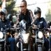 Foto Dirjen Pajak, Suryo Utomo, mengendari sepeda motor bersama komunitas moge Belasting Reijder  yang beredar luas di berbagai media.