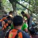 Tim Basarnas Gorontalo bersama warga melakukan evakuasi jasad IR, bocah 14 tahun yang hanyut di Sungai Bulango, Desa Lawonu, Kecamatan Tilango, Kabupaten Gorontalo.