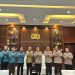 Kepala BPJS Ketenagakerjaan Cabang Gorontalo saat melakukan kunjungan ke Polda Gorontalo dan diterima langsung oleh Kapolda, Irjen Pol Helmy Santika di Lobby Presisi II Polda Gorontalo, Kamis (16/2/2023) (Foto Istimewa)