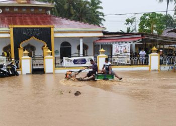 Banjir yang melanda Kecamatan Bulango Timur, pasca hujan deras mengguyur wilayah Bone Bolango, Ahad (26/3/2023).