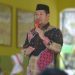 Anggota DPRD Kabupaten Bone Bolango, Syamsu Botutihe saat memberikan arahan dalam kegiatan Isra Mi'raj Nabi Muhammad Saw Tahun 1444 h di rangkaian dengan halal BI Halal di Madrasah Ibtidaiyah, Al-Hidayah, Desa Bulonthalagi Timur, Bulango Timur, Kabupaten Bone Bolango, Selasa (14/3/2023). (Foto: Putra/Gopos)