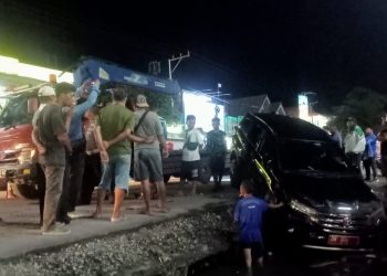 Mobnas Terperosok di Saluran Depan Indomaret HI Kota Gorontalo