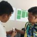 Iqram Bhari Akbar Baderan, Melihat Hasil Tes Urine di BNK Pohuwato, Rabu (10/05/2023) (F. Istimewa)