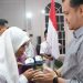 Wakil Walikota Gorontalo, Ryan Kono memberikan pesan kepada sejumlah peserta didik saat menghadiri acara penamatan sekolah siswa-siswi SMPN 2 Gorontalo di Gedung Graha Azizah, Selasa (6/6/2023)