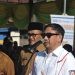 Bupati Bone Bolango, Hamim Pou saat memimpin apel kerja di lingkungan Pemerintah Kabupaten Bone Bolango yang digelar di Lapangan Ippot Tapa, Senin, (25/6/2023). (Foto Istimewa)