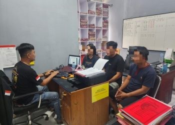 Tiga tersangka kasus dugaan penggelapan dan pengalihan objek jaminan fidusia resmi ditahan Polresta Gorontalo Kota. (f.humas polresta)