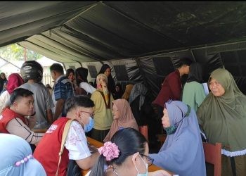 Suasana pelayanan kesehatan gratis dalam rangka HBDI yang digelar di Desa Sipayo, Kecamatan Paguat, Pohuwato, Sabtu (22/7/2023).