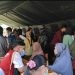 Suasana pelayanan kesehatan gratis dalam rangka HBDI yang digelar di Desa Sipayo, Kecamatan Paguat, Pohuwato, Sabtu (22/7/2023).