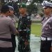 Pemasangan Fita Wakapolres Pohuwato, Kompol Adek Dermawan, Kepada Personil Lalu Lintas Pohuwato, di Halaman Polres Pohuwato, Senin 10/07/2023 (Yusuf/Gopos)