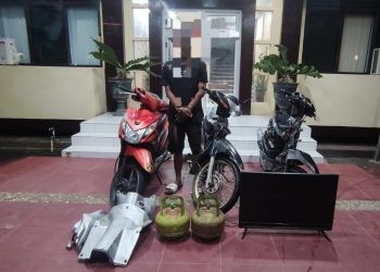 RHK saat diringkus polisi bersama barang bukti.(humaspolresta)