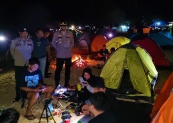 Kegiatan patroli jajaran Polres Bone Bolango di lokasi wisata pantai Kurenai, Desa Botubarani, Kabila Bone, Bone Bolango, Provinsi Gorontalo, Sabtu (22/7/2023).