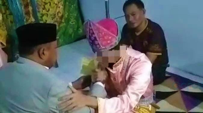 Prosesi ijab kabul lelaki IM yang merupakan tahanan Polresta Gorontalo Kota. (f. dok polresta)
