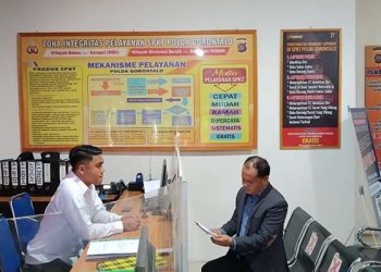 Kuasa Hukum Nelson Pomalingo, Ramdhan Kasim, menyampaikan laporan terhadap Ifana Abdulrahman ke Polda Gorontalo, Senin (7/8/2023).(istimewa)