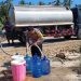 Proses penyaluran air bersih oleh Polres Pohuwato di Desa Taluduyunu Utara, Sabtu (30/9/2023).