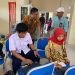 : Plt Kepala Dinas Sosial P3APPKB Bone Bolango, Fredy Lasut didampingi Ketua Pokja Bidang Pelatihan dan Pengembangan BKKBN Provinsi Gorontalo Hamdan A. Barmawi saat memantau para PKB dan PLKB melakukan penginputan data orientasi TPK di Aula Dinas Perpustakaan dan Kearsipan, Kamis (26/10/2023). (Foto Adit)