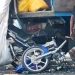 Tampak sepeda motor korban ringsek usai menabrak truk sampah di jalan Madura, Kota Gorontalo. (istimewa)