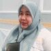 Ketua KPU Bone Bolango, Sutenti Lamuhu saat diwawancarai awak media.
