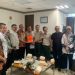 Penjabat Wali Kota Kotamobagu Asripan Nani bersama rombongan saat menyerahkan proposal bantuan peralatan dan logistik ke BNPB.