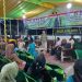 Plt Bupati Bone Bolango, Merlan S. Uloli saat memberikan sambutan pada kegiatan reses Anggota DPRD Provinsi Gorontalo, Faizal Hulukati di FH Center Kelurahan Tumbihe, Kecamatan Kabila, Rabu (8/11/2023) malam. (Foto Indra/Gopos)