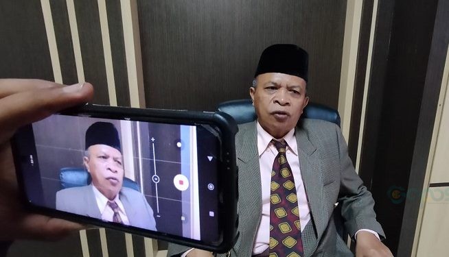 Wakil Rektor III, IAIN Sultan Amai Gorontalo, Lukman Arsyad saat diwawancarai di ruang kerjanya, Jumat (10/11/2023). (Putra/Gopos)