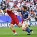 Bek Timnas Indonesia, Jordi Amat (kiri) menarik penyerang Jepang, Ayase Ueda pada laga Piala Asia 2023 di Stadion Al Thumama, Doha, Qatar, 24 Januari 2024. [Giuseppe CACACE / AFP]