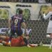 Penyerang Barcelona, Robert Lewandowski saat mencetak gol ke gawang Real Madrid pada final Piala Super Spanyol di Stadion King Fahd, di Riyadh, Arab Saudi, Senin (16/1/2023). Di pertandingan ini Lewandowski juga memberikan assist kepada Gavi yang mencetak gol. (AP Photo/Hussein Malla)
