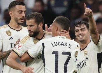 Penyerang Real Madrid asal Spanyol, Brahim Diaz (kanan) melakukan selebrasi setelah mencetak gol pertama timnya selama pertandingan pekan ke-7 Liga Spanyol 2023-2024 antara Real Madrid vs Las Palmas di stadion Santiago Bernabeu di Madrid pada 27 September 2023. Thomas COEX / AFP.