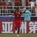 Penyerang Kirgistan Joel Kojo rayakan gol ke gawang Oman di laga pamungkas Grup F Piala Asia 2023 di Stadion Abdullah bin Khalifa di Doha pada 25 Januari 2024. KARIM JAAFAR / AFP