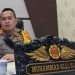 Kapolres Bone Bolango AKBP Muhammad Alli saat diwawancarai di ruang kerjanya, Kamis (4/1/2024).(F. Indra/gopos)