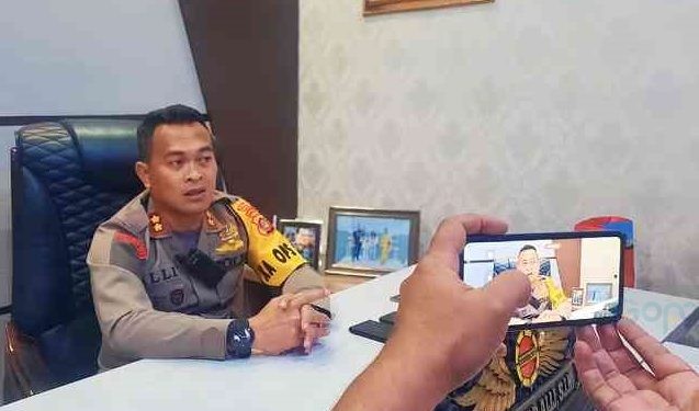 Kapolres Bone Bolango AKBP Muhammad Alli ketika memberikan keterangan pers, Jumat (12/1/2024).(F. Putra/gopos)
