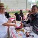 Wakil Ketua DPRD Provinsi Gorontalo Awaludin Pauweni saat menyalurkan hak suaranya di TPS 6 Desa Iluta, Kecamatan Batudaa, Kabupaten Gorontalo.