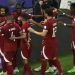 Penyerang timnas Qatar, Akram Afif melakukan selebrasi bersama rekan-rekannya setelah mencetak gol pertama timnya dari tendangan penalti pada pertandingan final Piala Asia 2023 antara Yordania vs Qatar di Stadion Lusail di Lusail, utara Doha pada 10 Februari 2024. KARIM JAAFAR / AFP.