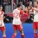 Penyerang Bayern Munich, Harry Kane (kanan) melakukan selebrasi bersama rekan-rekannya usai mencetak gol pembuka timnya selama leg kedua babak 16 besar Liga Champions 2023-2024 antara Bayern Munich vs Lazio di Allianz Arena, Munich, Jerman pada 6 Maret 2024 dini hari WIB. Kirill KUDRYAVTSEV / AFP.
