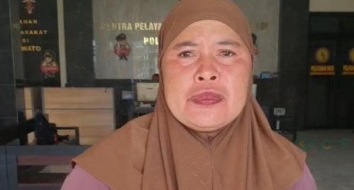 Yusni Lanio korban perampokan saat mengadu ke Polres Pohuwato.(f. Yusuf/Gopos)