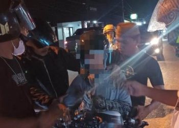 Tim rajawali satreskrim Polresta Gorontalo kota saat mengamankan RA terduga pelaku pemerkosaan di Kota Gorontalo, Senin (25/3/2024).